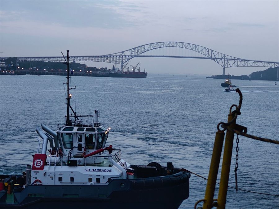 Tugboat on the water near the Bridge of the Americas in Panama